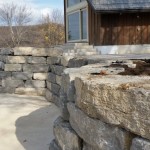 Natural stone retaining wall under construction, Collingwood area